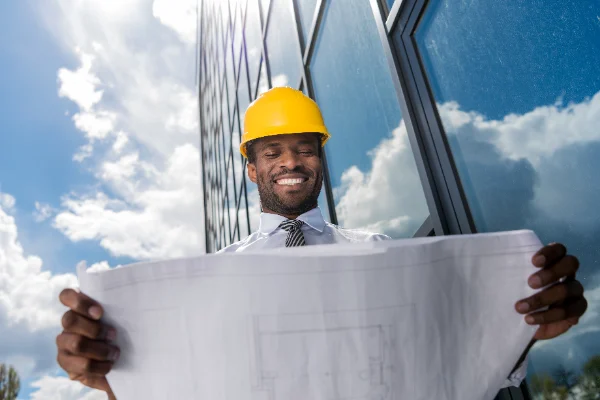 Architect holding building plans
