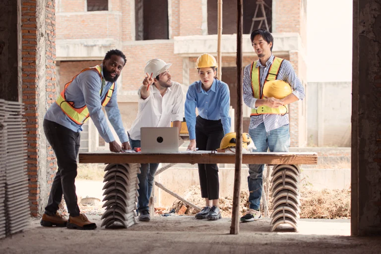 Construction workers discussing project plans